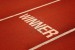 7394743-detail-of-a-red-tartan-athletic-track-on-the-stadium